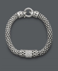 Embrace a little vintage-inspired elegance. This retro bracelet receives a modern touch with a tasteful, thick chain, intricate crisscross pattern, and rows of round-cut diamonds (1/4 ct. t.w.). Crafted in sterling silver. Approximate length: 8-1/2 inches. Embrace a little vintage-inspired elegance. This retro bracelet receives a modern touch with a tasteful, thick chain, intricate crisscross pattern, and rows of round-cut diamonds (1/4 ct. t.w.). Crafted in sterling silver. Approximate length: 8-1/2 inches.