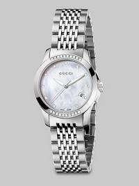From the G-Timeless Collection. A dazzling timepiece with a diamond accents, mother-of-pearl dial and a stainless steel link bracelet. Swiss quartz movementWater resistant to 5 ATMRound stainless steel case, 27mm (1) Diamond accented bezel, 0.12 tcwWhite mother-of-pearl dialDiamond markersDate display at 4 o'clockSecond hand Stainless steel link braceletMade in Switzerland From the G-Timeless Collection. A dazzling timepiece with a diamond accents, mother-of-pearl dial and a stainless steel link bracelet. Swiss quartz movementWater resistant to 5 ATMRound stainless steel case, 27mm (1) Diamond accented bezel, 0.12 tcwWhite mother-of-pearl dialDiamond markersDate display at 4 o'clockSecond hand Stainless steel link braceletMade in Switzerland