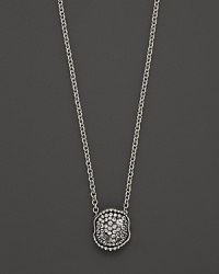 Gleaming white sapphires set in black rhodium organically shaped sterling silver. By Judith Ripka. Gleaming white sapphires set in black rhodium organically shaped sterling silver. By Judith Ripka.