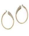 Classic gold hoops with a crystal twist. These glamorous earrings by Jessica Simpson feature clear crystal accents set in worn gold tone mixed metal. Approximate drop: 2-1/2 inches.