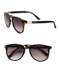 A classic design with signature style, crafted in lightweight plastic. Available in black havana tortoise frames with brown gradient lenses.Acetate100% UV ProtectionMade in Italy A classic design with signature style, crafted in lightweight plastic. Available in black havana tortoise frames with brown gradient lenses.Acetate100% UV ProtectionMade in Italy