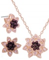 Flower power. City by City adds springtime style to your look all year long with this pretty pendant necklace and earrings set. Crafted in nickel-free rose gold tone mixed metal, the pendant features a sparkling cubic zirconia (1/2 ct. t.w.), as do the stud earrings (1/3 ct. t.w.). Approximate length (pendant): 15 inches with 3-inch extender. Approximate drop (pendant): 5/8 inch. Approximate diameter (earrings): 1/2 inch.