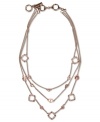 Layers of rosy warmth. Givenchy's three-row necklace highlights vintage rose stones strung from delicate chains. Crafted from brown gold tone mixed metal. Approximate length: 16 inches + 2-inch extender.