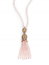 THE LOOKFeminine Metals collectionPink opal-colored beadsRhinestone ball and flower pendantPink opal-colored tassel accent14k goldplated settingNo closure; slip-on styleTHE MEASUREMENTPendant length, about 4Length, about 32ORIGINImported THE LOOKFeminine Metals collectionPink opal-colored beadsRhinestone ball and flower pendantPink opal-colored tassel accent14k goldplated settingNo closure; slip-on styleTHE MEASUREMENTPendant length, about 4Length, about 32ORIGINImported