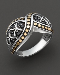 John Hardy's dragon-inspired Naga line adds this elegant ring to the mix. Its sweeping cross-over pattern is adorned with gold studs and silver scale overlays over clusters of black sapphire. Designed by John Hardy. John Hardy's dragon-inspired Naga line adds this elegant ring to the mix. Its sweeping cross-over pattern is adorned with gold studs and silver scale overlays over clusters of black sapphire. Designed by John Hardy.