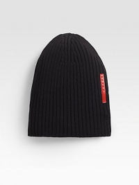 Wool channel ribbed beanie hat with signature leather logo detail.WoolDry cleanMade in Italy Wool channel ribbed beanie hat with signature leather logo detail.WoolDry cleanMade in Italy
