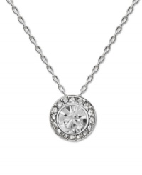 Subtle sparkle for the savvy fashionista. Swarovski's chic circular pendant features a round-cut crystal center stone surrounded by a halo of glittering crystals. Setting and chain crafted in silver tone mixed metal. Approximate length: 15 inches. Approximate drop: 3/4 inches. Subtle sparkle for the savvy fashionista. Swarovski's chic circular pendant features a round-cut crystal center stone surrounded by a halo of glittering crystals. Setting and chain crafted in silver tone mixed metal. Approximate length: 15 inches. Approximate drop: 3/4 inches.