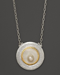 A Mabe pearl gleams at the center of this artful pendant necklace in sterling silver with 24K yellow gold accents. From Gurhan. A Mabe pearl gleams at the center of this artful pendant necklace in sterling silver with 24K yellow gold accents. From Gurhan.