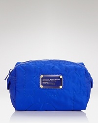 Amp up your beauty bag with this boldly-hued nylon style from MARC BY MARC JACOBS, accented by the brand's signature logo plaque. Amp up your beauty bag with this boldly-hued nylon style from MARC BY MARC JACOBS, accented by the brand's signature logo plaque.