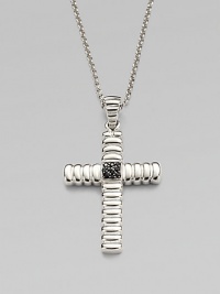 A polished cross pendant is suspended from a chain necklace, both crafted in sterling silver.From the Bedeg CollectionSterling silverPendant, 1¼W x 1½HNecklace, 24 lengthImported A polished cross pendant is suspended from a chain necklace, both crafted in sterling silver.From the Bedeg CollectionSterling silverPendant, 1¼W x 1½HNecklace, 24 lengthImported