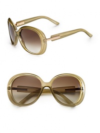 A flattering frame for any face shape in glossy plastic with logo accented metal temples. Available in golden sand with brown gradient lens or grey with grey gradient lens. Logo temples100% UV protectionMade in Italy A flattering frame for any face shape in glossy plastic with logo accented metal temples. Available in golden sand with brown gradient lens or grey with grey gradient lens. Logo temples100% UV protectionMade in Italy