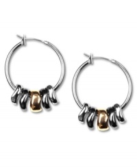 A versatile touch. Petite hoop earrings decorated by wavy beads complement a vast array of looks. Crafted in silver, hematite and rose gold tone mixed metal. Approximate diameter: 3/4 inch. Approximate drop: 1 inch. A versatile touch. Petite hoop earrings decorated by wavy beads complement a vast array of looks. Crafted in silver, hematite and rose gold tone mixed metal. Approximate diameter: 3/4 inch. Approximate drop: 1 inch.