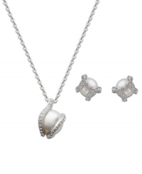 Shimmery pearls are essentials in every woman's jewelry box! Swarovski crystal pearls combine with clear crystal pavé and adds subtle beauty to an elegant outfit. Crafted in mixed metal. Approximate length: 15 inches. Approximate pendant drop: 3/4 inch. Approximate earring diameter: 1/2 inch. Shimmery pearls are essentials in every woman's jewelry box! Swarovski crystal pearls combine with clear crystal pavé and adds subtle beauty to an elegant outfit. Crafted in mixed metal. Approximate length: 15 inches. Approximate pendant drop: 3/4 inch. Approximate earring diameter: 1/2 inch.