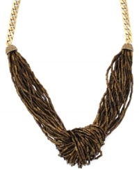 Get down to your roots in dramatic earth tones. Jessica Simpson's chic knotted necklace combines multiple strands of acrylic beads in an organic color palette of bronze and brown. Set in gold tone mixed metal. Approximate length: 17 inches. Get down to your roots in dramatic earth tones. Jessica Simpson's chic knotted necklace combines multiple strands of acrylic beads in an organic color palette of bronze and brown. Set in gold tone mixed metal. Approximate length: 17 inches.