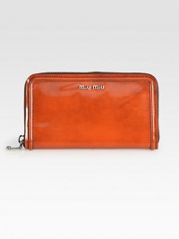 Polished leather with zip closure.Zip-around closureOne inside zip pocketEigth credit card slotsTwo bill compartmentsLeather lining7½W X 4H X ¾DMade in Italy Polished leather with zip closure.Zip-around closureOne inside zip pocketEigth credit card slotsTwo bill compartmentsLeather lining7½W X 4H X ¾DMade in Italy