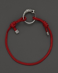 Eastern elements inform John Hardy's dragon head bracelet. It features a cotton cord band with an adjustable sliding closure. Eastern elements inform John Hardy's dragon head bracelet. It features a cotton cord band with an adjustable sliding closure.