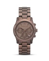 MICHAEL Michael Kors' chic timepiece boasts three-eye functionality and up-to-the-minute style.