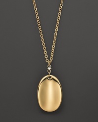 A gleaming oval of 18K yellow gold adds luxe to your look. By Roberto Coin. A gleaming oval of 18K yellow gold adds luxe to your look. By Roberto Coin.