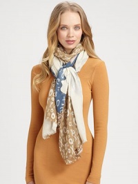 An artistic print with a sprinkle of letters and numbers throughout. 70% cashmere/30% silkAbout 36 X 80Dry cleanImported An artistic print with a sprinkle of letters and numbers throughout. 70% cashmere/30% silkAbout 36 X 80Dry cleanImported