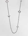 A long graceful box chain of sterling silver is dotted with an array of shapely quatrefoil charms in open, solid and cable styles, adding character and understated elegance.Sterling silverLength, about 36Lobster clasp closureImported