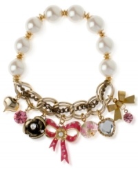 Quite charming. This multi-charm half stretch bracelet from Betsey Johnson is crafted from antique gold-tone mixed metal, and features glass pearls and glistening accents for a whimsical effect. Item comes packaged in a signature Betsey Johnson Gift Box. Approximate length: 7-1/2 inches. Quite charming. This multi-charm half stretch bracelet from Betsey Johnson is crafted from antique gold-tone mixed metal, and features glass pearls and glistening accents for a whimsical effect. Item comes packaged in a signature Betsey Johnson Gift Box. Approximate length: 7-1/2 inches.