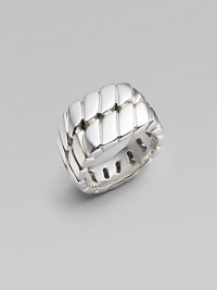 A bold signet style crafted with in gleaming sterling silver with curb chain detail. About ¾ diam. Imported