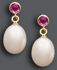 A sweet touch of femininity. These polished drops combine cultured freshwater pearls (8-1/2-9 mm) with round-cut amethyst (1/2 ct. t.w.) in a 14k gold bezel setting. Approximate drop: 3/4 inch. A sweet touch of femininity. These polished drops combine cultured freshwater pearls (8-1/2-9 mm) with round-cut amethyst (1/2 ct. t.w.) in a 14k gold bezel setting. Approximate drop: 3/4 inch.