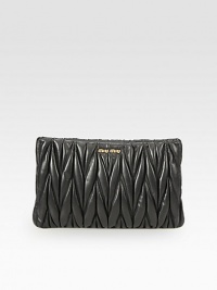 This beautifully quilted leather style has a simply chic design.Top zip closureOne inside zip pocketThree inside open pocketsSatin lining12½W X 8H X 1DMade in Italy This beautifully quilted leather style has a simply chic design.Top zip closureOne inside zip pocketThree inside open pocketsSatin lining12½W X 8H X 1DMade in Italy