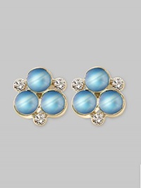 The lovely iridescence of cabochon moonstones, clustered amid diamond accents, gives these delicate earrings the feeling of being lit from within. Diamonds, 0.18 tcw Moonstone 18k yellow gold Length, about ½ Post back Made in Italy The lovely iridescence of cabochon moonstones, clustered amid diamond accents, gives these delicate earrings the feeling of being lit from within. Diamonds, 0.18 tcw Moonstone 18k yellow gold Length, about ½ Post back Made in Italy