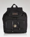This season, kate spade new york's iconic nylon backpack gets a hard-hitting makeover. Shoulder this to be hands free in the city.