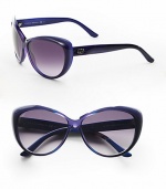 A glamourous, tonal style in lightweight acetate. Available in dark grey/light grey with grey gradient lens and blue/violet with smoke gradient lens. Logo temples100% UV protectionMade in Italy 