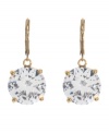 Dare to shine in Betsey Johnson's glamorous drops. Earrings feature round-cut crystal drops suspended from an antique gold tone mixed metal setting. Approximate drop: 1-3/4 inches.