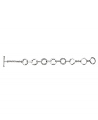 Let fashion come full circle. This delightful toggle bracelet by Swarovski features pave-set crystals in a mixed metal setting. Approximate length: 7 inches. Let fashion come full circle. This delightful toggle bracelet by Swarovski features pave-set crystals in a mixed metal setting. Approximate length: 7 inches.