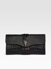 A sleek flap bag of croc-embossed rubber, adorned with an antiqued raven medallion.Magnetic flap closureOne inside zip pocketFully lined11¾W X 6H X 2DMade in the USA A sleek flap bag of croc-embossed rubber, adorned with an antiqued raven medallion.Magnetic flap closureOne inside zip pocketFully lined11¾W X 6H X 2DMade in the USA