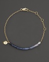 In graduated hues, rough-cut sapphire briolettes adorn a 14K gold chain.