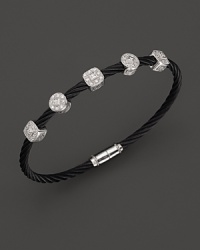 A stackable bangle in white gold and black PVD cable with five diamond stations. Designed by Charriol. A stackable bangle in white gold and black PVD cable with five diamond stations. Designed by Charriol.