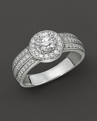 Round brilliant diamond ring with diamond band. Round brilliant diamond ring with diamond band.