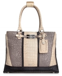 An untamed style with refined appeal. This crocodile print design from GUESS features sleek silver-tone hardware, signature front detail and a spacious tote silhouette. An untamed style with refined appeal. This crocodile print design from GUESS features sleek silver-tone hardware, signature front detail and a spacious tote silhouette.