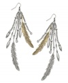 Falling leaves. These Bar III metal earrings are always in season. Features burnished gold and silver-plated leaves, multi-metal silver-tone chain tassels with beads and clear stones. Approximate drop: 4-1/2 inches.
