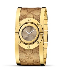 A glamorous watch from Gucci with sun-brushed dial and logo-embossed leather bangle. A glamorous watch from Gucci with sun-brushed dial and logo-embossed leather bangle.