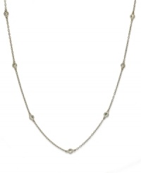 Inch by inch of luminous sparkle. B. Brilliant's delicate necklace features eleven round-cut cubic zirconia stations (1-1/10 ct. t.w.) set in 18k gold over sterling silver. Approximate length: 36 inches. Inch by inch of luminous sparkle. B. Brilliant's delicate necklace features eleven round-cut cubic zirconia stations (1-1/10 ct. t.w.) set in 18k gold over sterling silver. Approximate length: 36 inches.