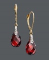 Add some sizzle with red-hot color. These dramatic drop earrings feature pear-cut garnet (7-1/5 ct. t.w.) and sparkling diamond accents. Crafted in 14k gold. Approximate drop: 1-1/4 inches.