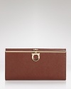 Pulled together perfection starts with practical accessories like this leather wallet from Salvatore Ferragamo. It's a beautiful accompaniment for every look with plenty of pockets to keep the essentials in place.