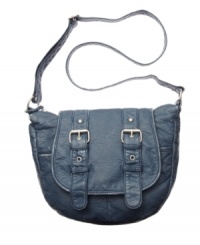 Well worn: The textured, washed material of American Rag's Taryn foldover crossbody bag conveys a lived in look and a cool, casually chic vibe. With decorative buckle hardware detailing, it includes an adjustable strap and magnetic snap closure. Well worn: The textured, washed material of American Rag's Taryn foldover crossbody bag conveys a lived in look and a cool, casually chic vibe. With decorative buckle hardware detailing, it includes an adjustable strap and magnetic snap closure.