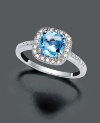 An indulgent gift for a December birthday girl...or simply someone special with exquisite taste. Cushion-cut blue topaz (1-3/8 ct. t.w.) and round-cut diamond (1/10 ct.t.w) make for a stunning duo. Victoria Townsend ring crafted in sterling silver. Size 7. An indulgent gift for a December birthday girl...or simply someone special with exquisite taste. Cushion-cut blue topaz (1-3/8 ct. t.w.) and round-cut diamond (1/10 ct.t.w) make for a stunning duo. Victoria Townsend ring crafted in sterling silver. Size 7.