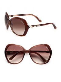 A stylish, angular frame in lightweight plastic. Available in brown shade with brown gradient lens. Metal accented logo temples100% UV protectionMade in Italy A stylish, angular frame in lightweight plastic. Available in brown shade with brown gradient lens. Metal accented logo temples100% UV protectionMade in Italy