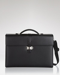 Crafted from black southern German full-grain calfskin, this double-gusset briefcase is sleek and fully loaded with pockets for your PDA, 2 writing instruments, and small and medium documents. Unique flap closure with 2 locking options. Crafted from black southern German full-grain calfskin, this double-gusset briefcase is sleek and fully loaded with pockets for your PDA, 2 writing instruments, and small and medium documents. Unique flap closure with 2 locking options.