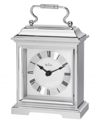 This formal carriage clock by Bulova adds elegance to an end table or side board. Rectangular spun and brushed aluminum case features a curved handle at top. Silver tone dial displays black Roman numerals and two hands. This formal carriage clock by Bulova adds elegance to an end table or side board. Rectangular spun and brushed aluminum case features a curved handle at top. Silver tone dial displays black Roman numerals and two hands.