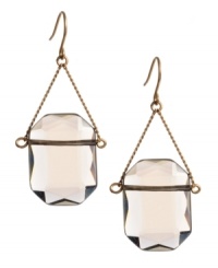 The epitome of sheer elegance. Kenneth Cole New York earrings feature smoky glass stone drops suspended from delicate chains. Setting crafted in worn gold tone mixed metal. Approximate drop: 1-1/2 inches. The epitome of sheer elegance. Kenneth Cole New York earrings feature smoky glass stone drops suspended from delicate chains. Setting crafted in worn gold tone mixed metal. Approximate drop: 1-1/2 inches.
