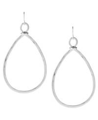 Let your style roam. Kenneth Cole New York's hammered hoop earrings add a classic teardrop touch to any look. Set in silver tone mixed metal. Approximate drop: 2-3/4 inches. Approximate width: 1-1/2 inches. Let your style roam. Kenneth Cole New York's hammered hoop earrings add a classic teardrop touch to any look. Set in silver tone mixed metal. Approximate drop: 2-3/4 inches. Approximate width: 1-1/2 inches.